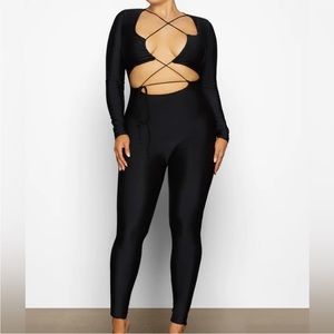 Skims lace up catsuit